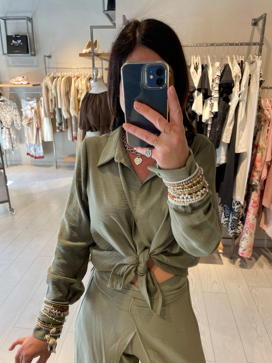 Blusa con bracciali Have One